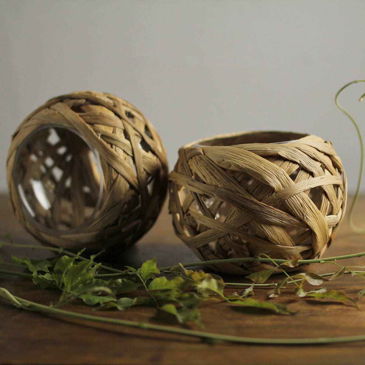 Set of Two Decorative Hyacinth-Wrapped Glass Vases / Candle Holders